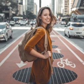 a woman standing on a street