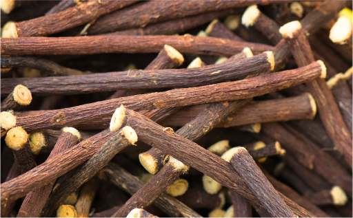a pile of sticks with white tip